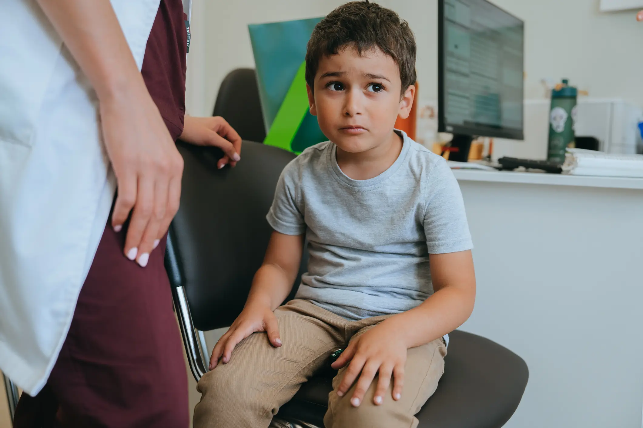 Small boy being scolded.